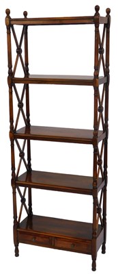 Lot 567 - A 20thC mahogany five-tier etagere, each shelf...