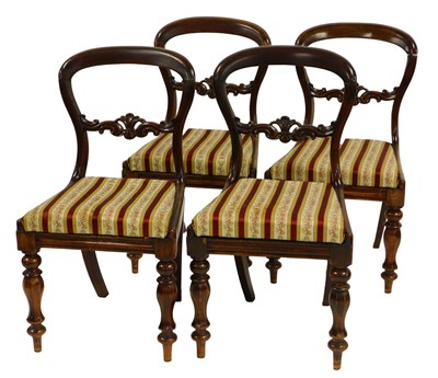 Lot 570 - A set of four Victorian mahogany balloon back...