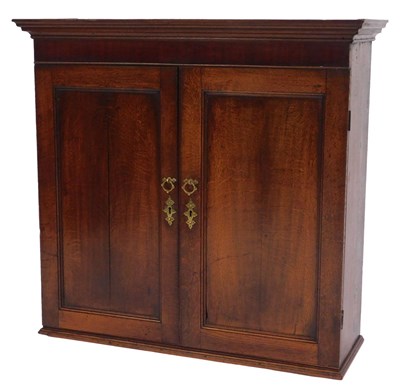 Lot 45 - An 18thC oak cabinet, the top with a moulded...