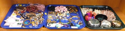 Lot 2132 - Costume jewellery, in the form of bangles,...