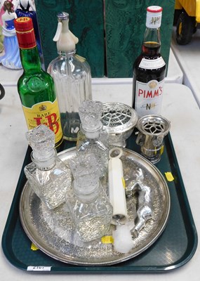 Lot 2161 - A Schweppes soda syphon, a plated circular...
