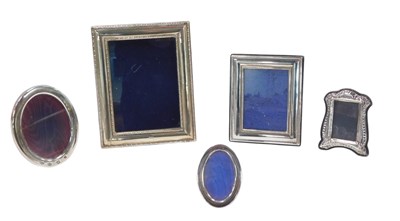 Lot 424 - A quantity of silver mounted photograph frames,...