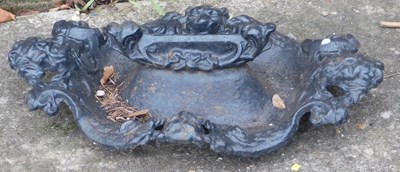 Lot 419 - A 19thC cast iron boot scraper, decorated with...