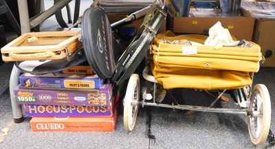Lot 2211 - A small child's doll pram, various badminton...
