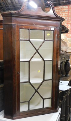 Lot 1084 - A George III mahogany astragal glazed corner...