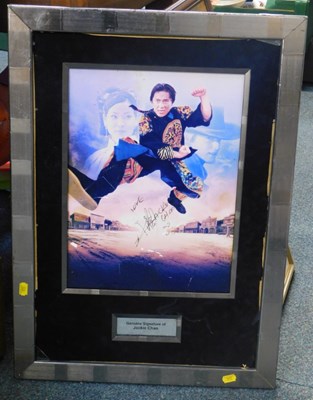 Lot 2245 - A signed and framed picture of Jackie Chan.