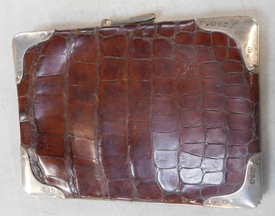 Lot 2117 - A faux crocodile skin wallet.