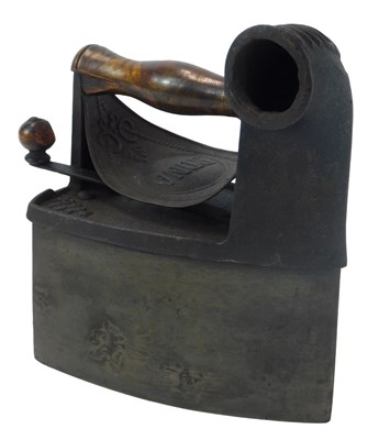 Lot 521a - A 19thC Edna cast iron coal iron, with a...