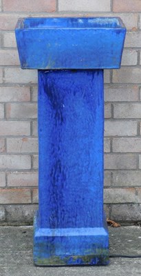 Lot 417 - A blue glazed water feature, on a pedestal...