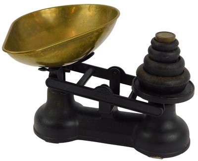 Lot 168 - A pair of cast iron Salter kitchen scales, a...