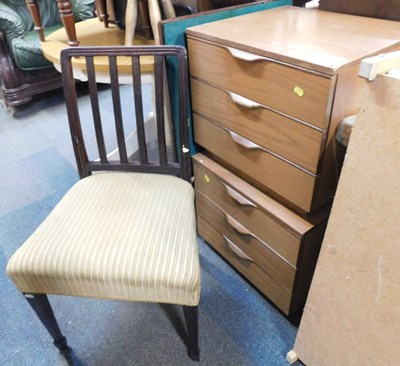 Lot 1085 - A beige upholstered dining chair, raised on...