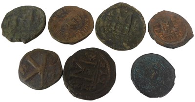 Lot 112 - Seven Byzantine Follis style coins, bearing...