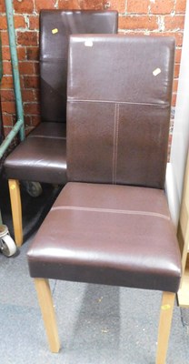 Lot 1011 - Two dining chairs, upholstered in leatherette...