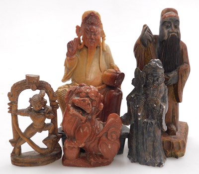 Lot 44 - A 19thC Chinese soapstone figure of a deity on...