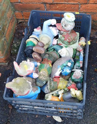 Lot 1103 - A basket containing garden gnomes. (approx 10)