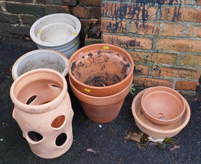 Lot 1104 - A selection of terracotta garden plant pots.