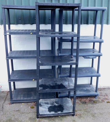 Lot 1112 - Three plastic storage units, of five shelves...