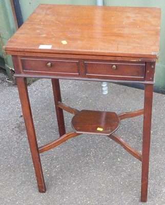 Lot 1125 - A 19thC mahogany fold over tea table, with two...