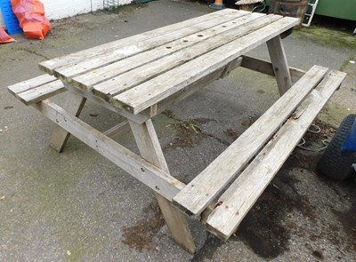 Lot 1132 - A picnic table and bench.