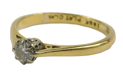 Lot 429 - An 18ct gold solitaire ring, 1.9g all in.