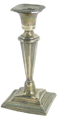 Lot 637 - A George V loaded silver candlestick, with a...