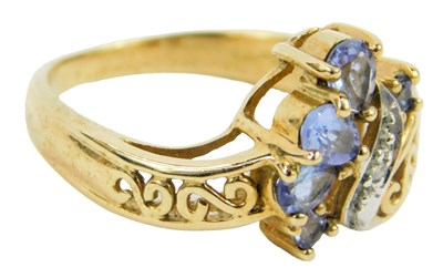 Lot 649 - A 9ct gold tanzanite dress ring, size J/L, 3.0g.
