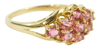 Lot 650 - A 9ct gold and pink topaz dress ring, size Q,...