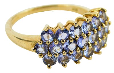 Lot 640 - A 9ct gold and tanzanite dress ring, size N/O,...