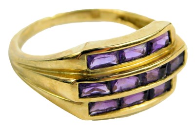 Lot 641 - A 9ct gold and amethyst dress ring, size M/N,...