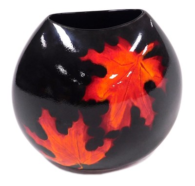 Lot 16 - A Poole Pottery Autumn Leaves pattern pottery...