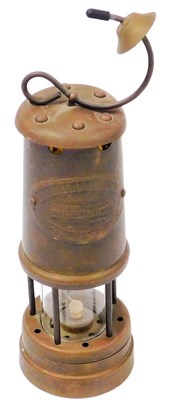Lot 53 - A British Coal Mining Company brass miners...