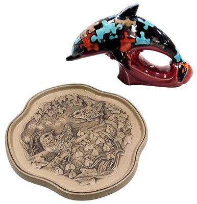 Lot 37 - A Poole pottery Jigsaw pattern dolphin,...