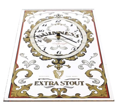Lot 79 - A Guinness advertising clock mirror, Extra...