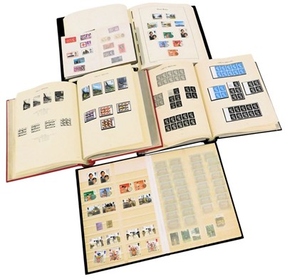 Lot 102 - Stamps.- GB.- QEII. Four albums and a stock...