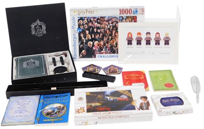 Lot 143 - A group of Harry Potter collectables,...
