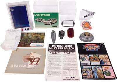 Lot 224 - A group of automobilia, including an Austin...