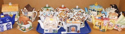 Lot 2049 - A group of novelty and other teapots, to...