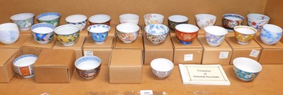 Lot 2052 - A group of Treasures of Oriental porcelain tea...
