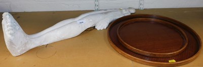 Lot 2090 - Two teak trays, and a plaster figure of a...