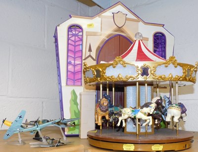 Lot 2080 - A carousel together with die cast planes, and...