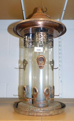 Lot 2086 - A Copper effect bird feeder.