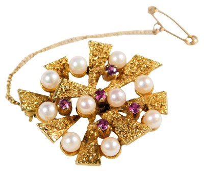 Lot 203 - A 9ct gold ruby and seed pearl brooch, in a...