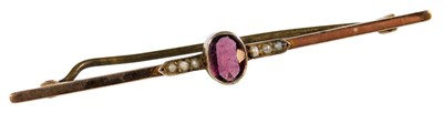 Lot 205 - A Edwardian garnet and seed pearl set bar...