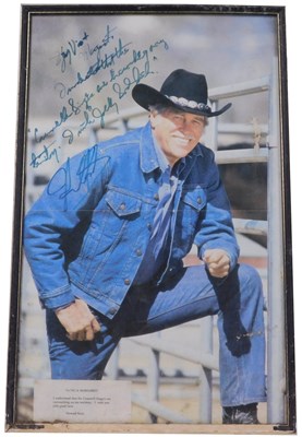 Lot 299 - A print of Howard Keel, signed and dedicated,...