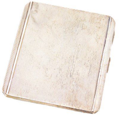 Lot 355 - A George VI silver cigarette case, with engine...