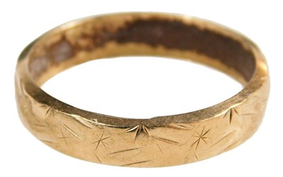 Lot 371 - A 9ct gold wedding band, with engraved...