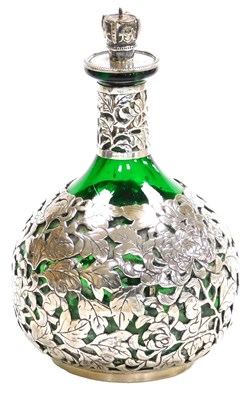Lot 359 - A late 19th/early 20thC Chinese green glass...