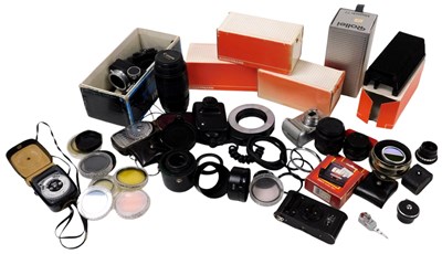 Lot 340 - A Canon 100-300mm zoom lens, further lenses,...
