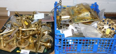 Lot 2099 - A group of brass door handles, lock plates,...