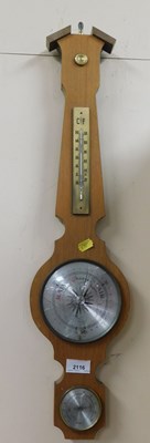 Lot 2116 - A teak banjo wall barometer, with mercury...